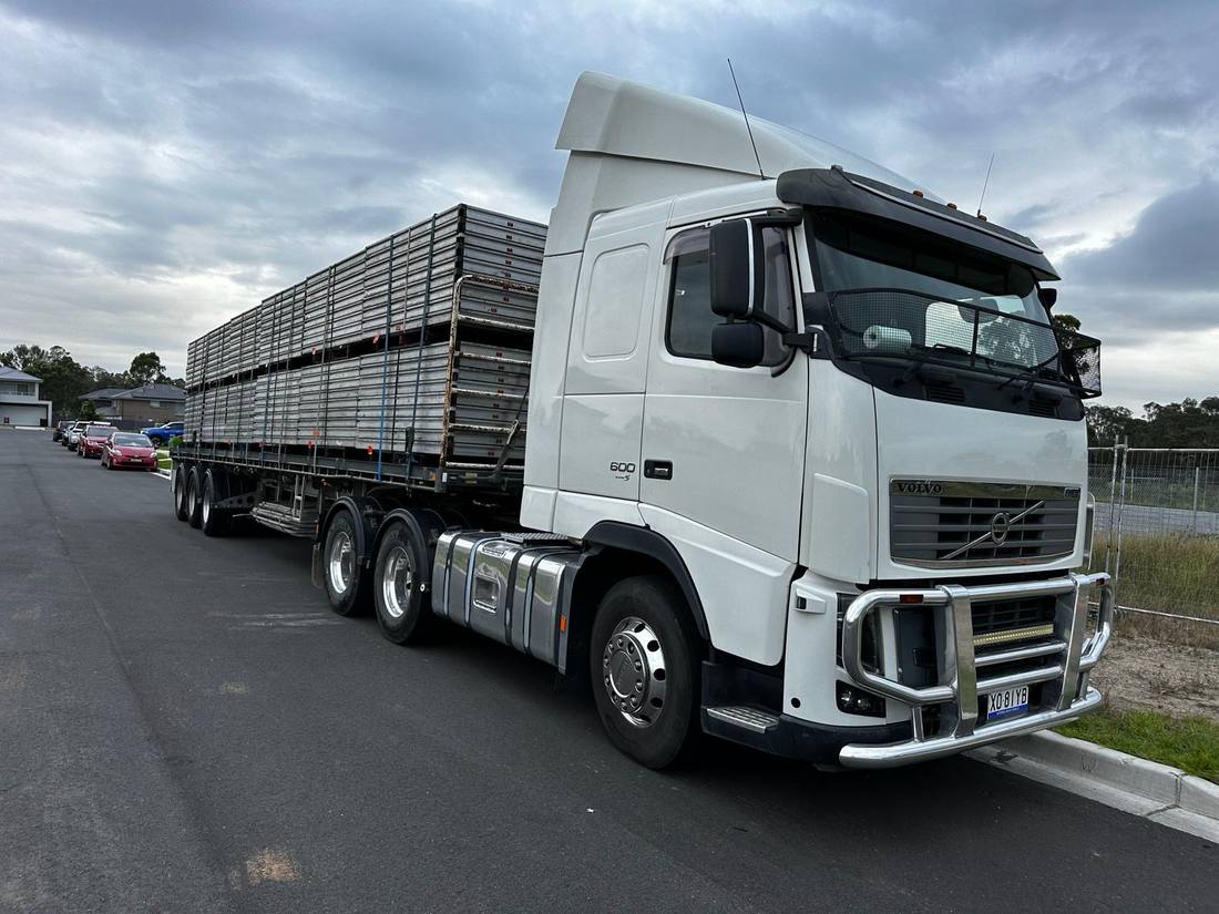 Quickcargo flat-top semi-trailer loaded and ready for an interstate line-haul run